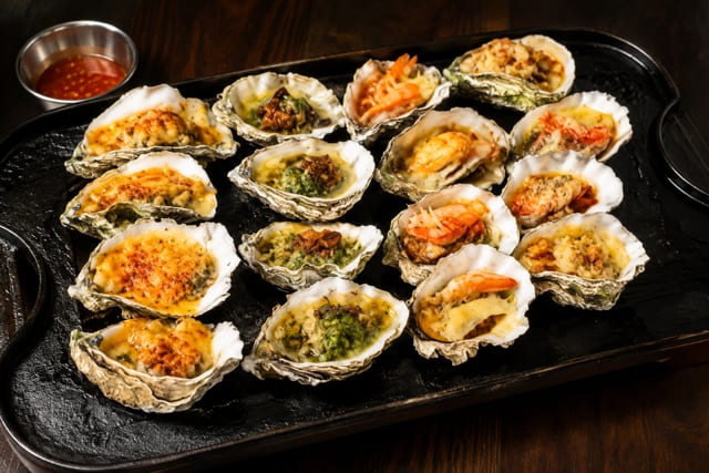 Nola Grilled Oysters Combo.